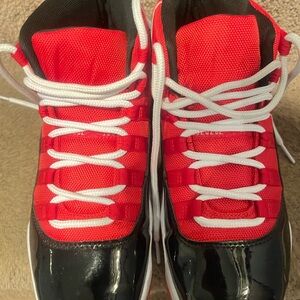 New size 9 Red and Black Jordan Sneakers. Belong to my son never worn.